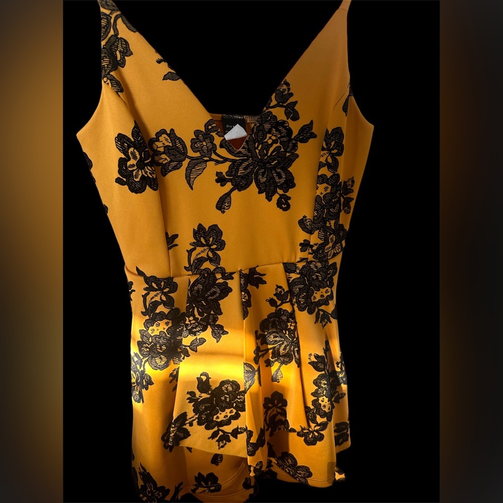 Gorgeous black and yellow romper